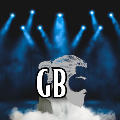 Greybeard Logo, under a spotlight on a stage.